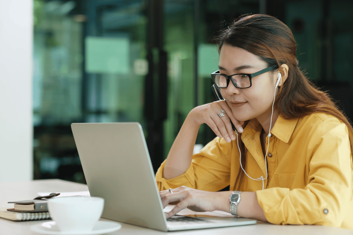 woman looking at a computer