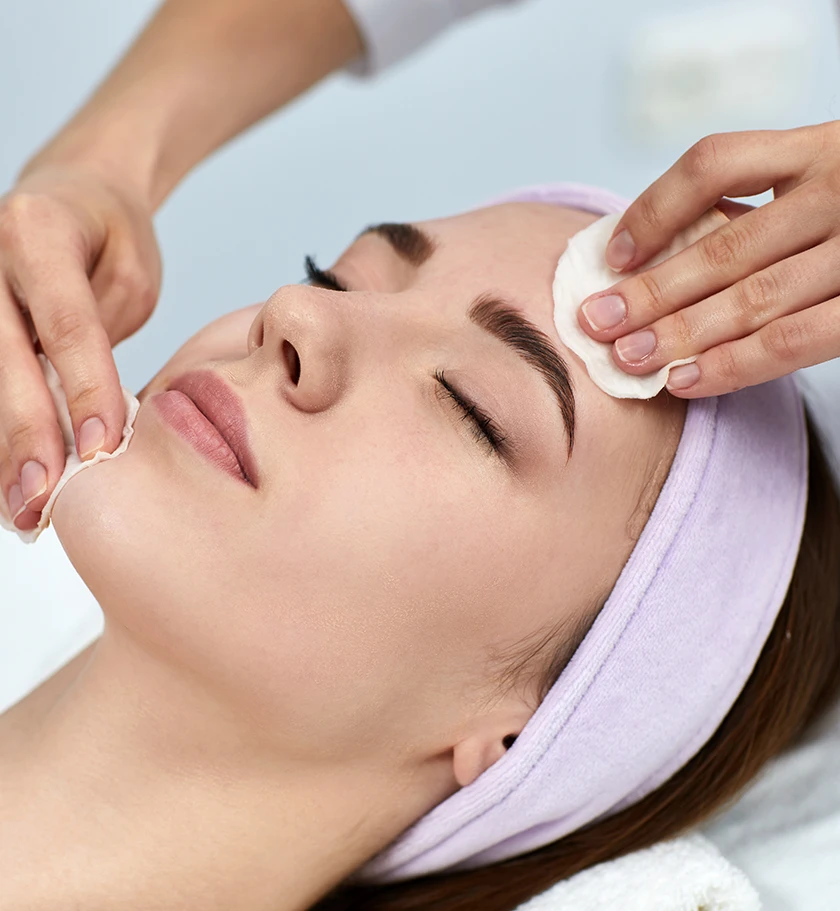a woman getting a facial